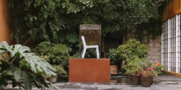 Recycled-plastic plinths hold furniture at "secret" Barragán house in Mexico City