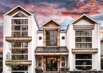 Step into this light-filled modern farmhouse in Calgary with beautiful design details